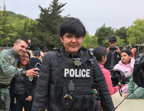 Camper in police vest